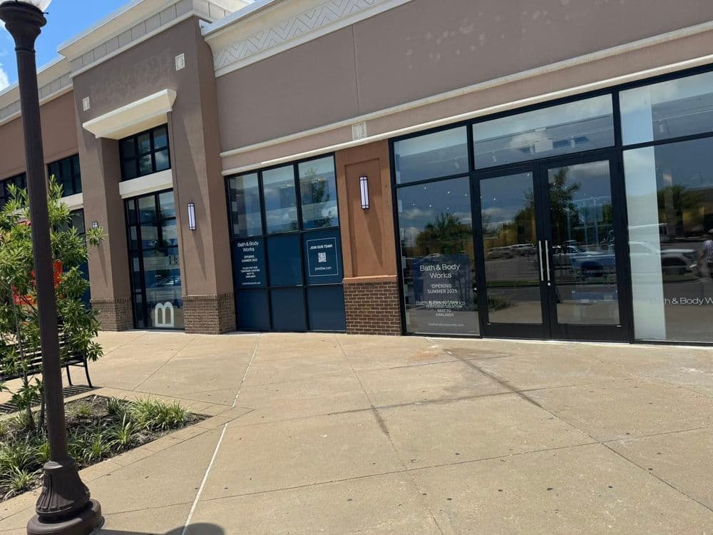 Exterior view of Bath & Body Works storefront with modern design and large glass windows.
